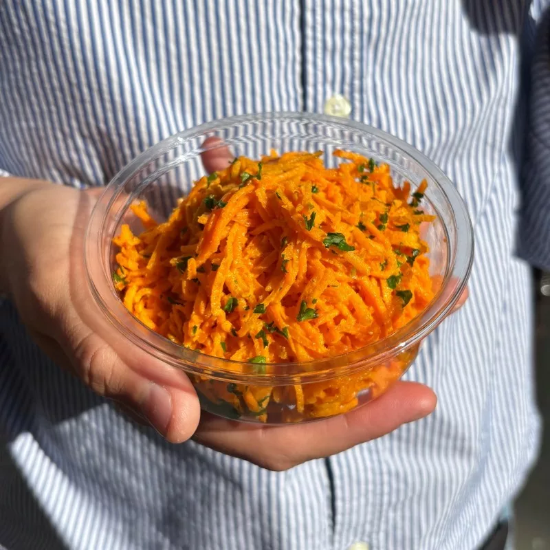Grated carrots, citrus dressing